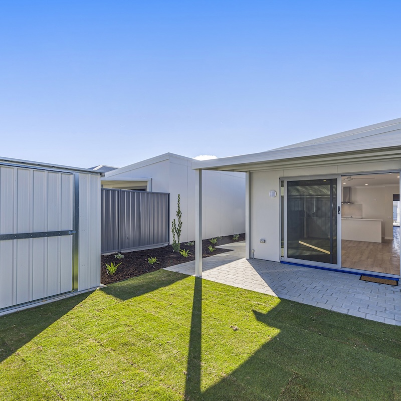 metrostrata property developments perth builders duplex side by side timber framed construction backyard shed grass forrestdale